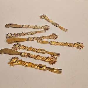 Vintage serving utensils,  miniature knives and forks, decorative serving ware
