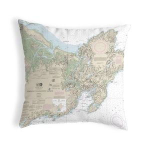 May include: A nautical chart pillow featuring a detailed map of Ipswich Bay to Gloucester Harbor, Massachusetts. The pillow is white with a beige map design and includes a compass rose and depth soundings.