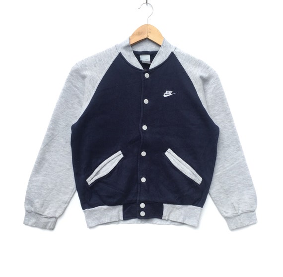 nike swoosh logo jacket