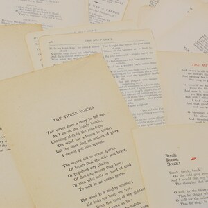 May include: A collection of vintage paper scraps with handwritten poetry and text. The paper is cream colored and has a distressed, aged look. The text includes poems titled "The Three Voices" and "The May Queen".