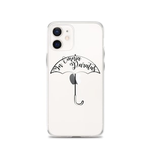 May include: A clear phone case with a black and white umbrella design. The umbrella has the text "In Omnia Paratus" written on it.