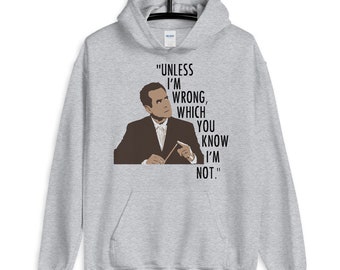May include: A gray hooded sweatshirt with a graphic of a man in a suit and the text "Unless I'm wrong, which you know I'm not."