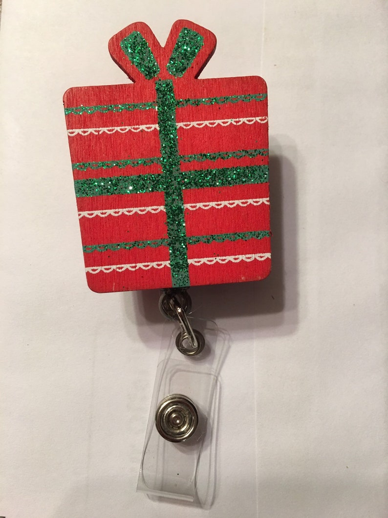 Red striped Christmas present retractable badge reel
