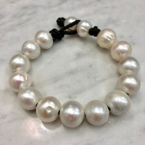 Large Iridescent White Pearl Bracelet Strung on Black Leather