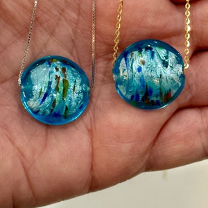Handmade Iridescent Sky Blue Swirled Murano Glass on Sterling Chain