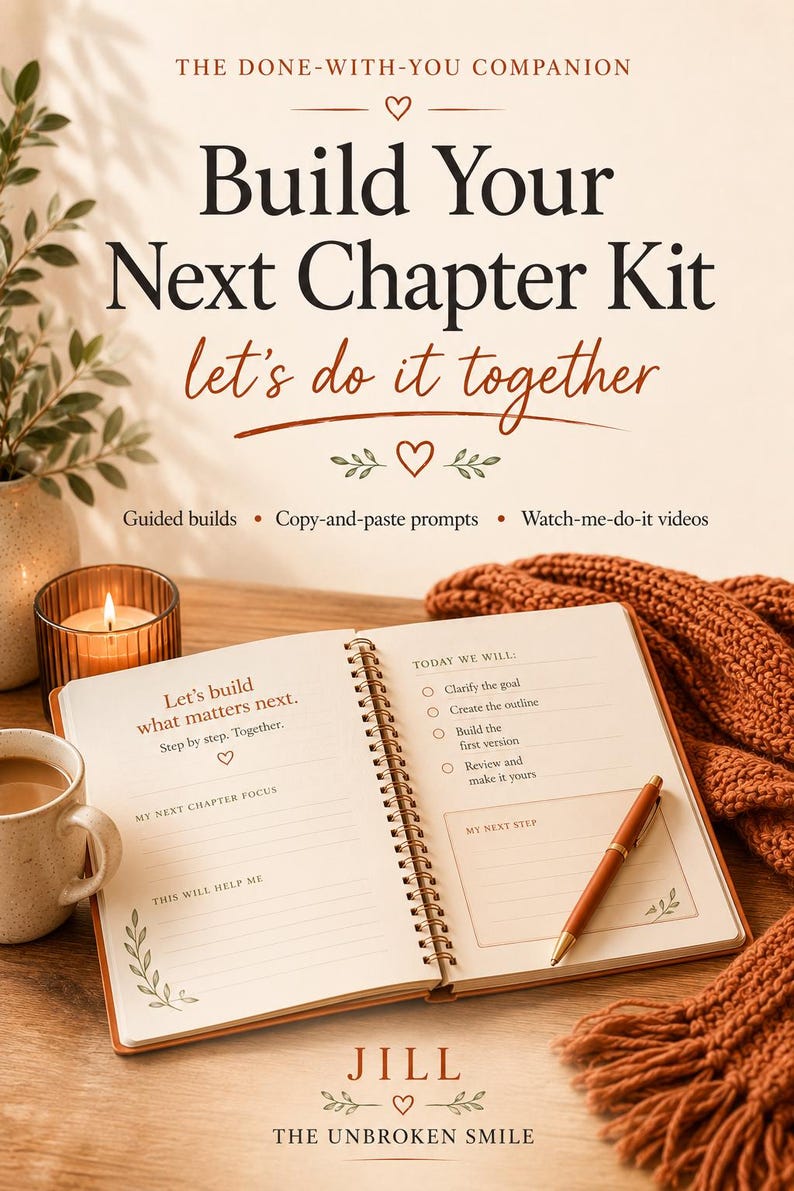 May include: A journal titled "Build Your Next Chapter Kit" with the text "let's do it together." The open journal displays prompts and a pen. A lit candle, a mug of coffee, and a scarf are also visible.