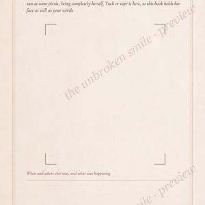 May include: A cream-colored journal page with the heading A photograph of her. It includes text instructions for attaching a photo, corner markers for placement, a line for writing when and where, and a small floral illustration in the bottom corner.