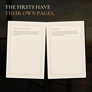 May include: An open journal with cream-colored pages featuring the text THE FIRSTS HAVE THEIR OWN PAGES. The left page is titled The first Father's Day without him, and the right page is titled The first holidays, both with lined writing space.