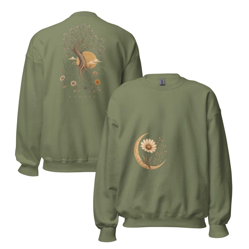 May include: An olive green crewneck sweatshirt featuring a graphic on the back of a tree, a large sun, and flowers with the text ROOTED below. The front of the sweatshirt displays a smaller graphic of a single daisy flower centered within a crescent moon.