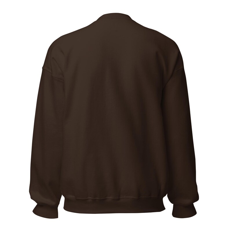 May include: A solid dark brown long-sleeve sweatshirt featuring a crew neckline, ribbed cuffs at the wrists, and a ribbed hem at the bottom. The garment is displayed from the back, showing a plain, unpatterned fabric surface throughout the entire piece.