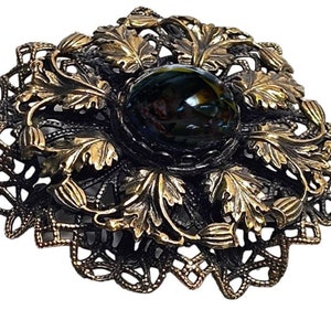Exquisite 1950s Floral Estate Pin with Black Stone in Metal Setting