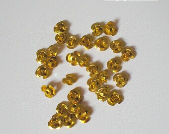 Set of 15 gold metal flowers