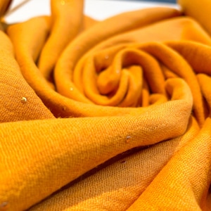 Cotton Double Gauze Fabric in Turmeric with Gold Spots