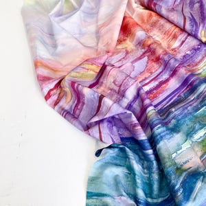 May include: A white ceramic mug with a black handle and the text "But First, Coffee" in a bold, black font. The mug is likely 325 ml in size, ideal for a morning beverage.