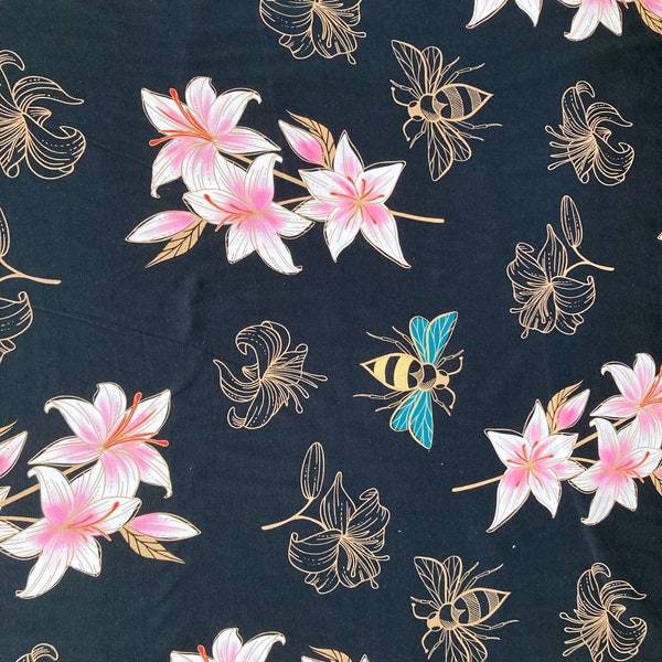 Organic Cotton Jersey Knit With Large Lily and Bee print on a Black Background