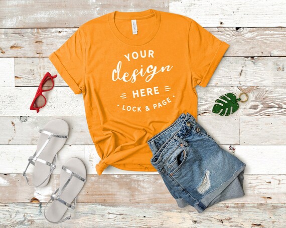 Bella Canvas Orange 3001 Mockup T-Shirt Flat Lay Denim Bella Canvas Orange 3001 Mockup T-Shirt Flat Lay Denim