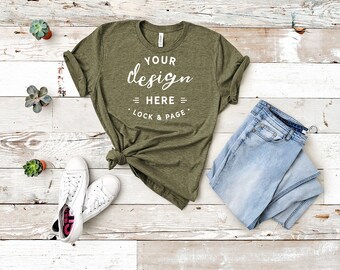 Download Free Bella Canvas 3001 Heather Olive Green Unisex Tshirt Mockup Flat Lay Dark Green Grass Green Shirt Mock Up Vintage Wood Backdrop Free Psd Mockups Templates PSD Mockup Template