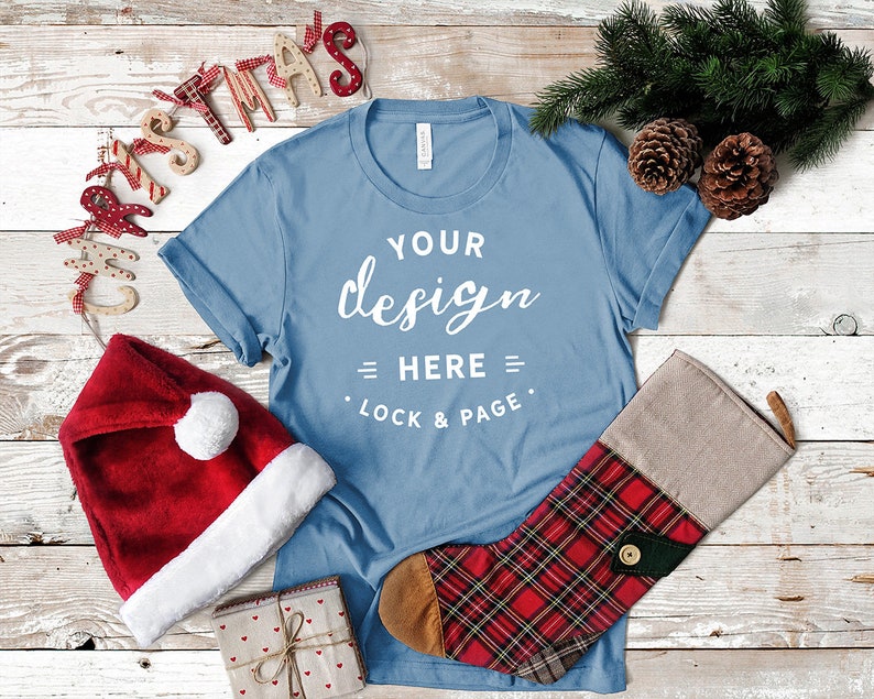 Download Festive T Shirt Mockup Bella Canvas 3001 Steel Blue Xmas Tee Shirt Flat Lay With Christmas Stocking Santa Hat And Pine Cones Photography Art Collectibles Colonialgolfhart Com