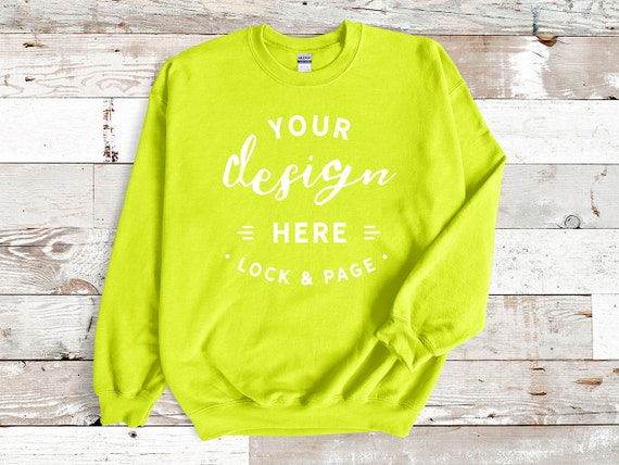 Safety Green Gildan 18000 Unisex Sweatshirt Mockup Jumper Flat Lay On Beach House Background