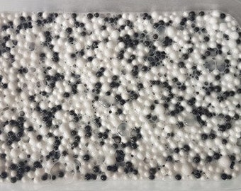 Oreo Crunch - white classic, scented with cookie with plenty of white & black foam balls, lovely, stretchy, clicky, cheap slime from the UK