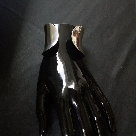 Broad silver bangle of Esprit