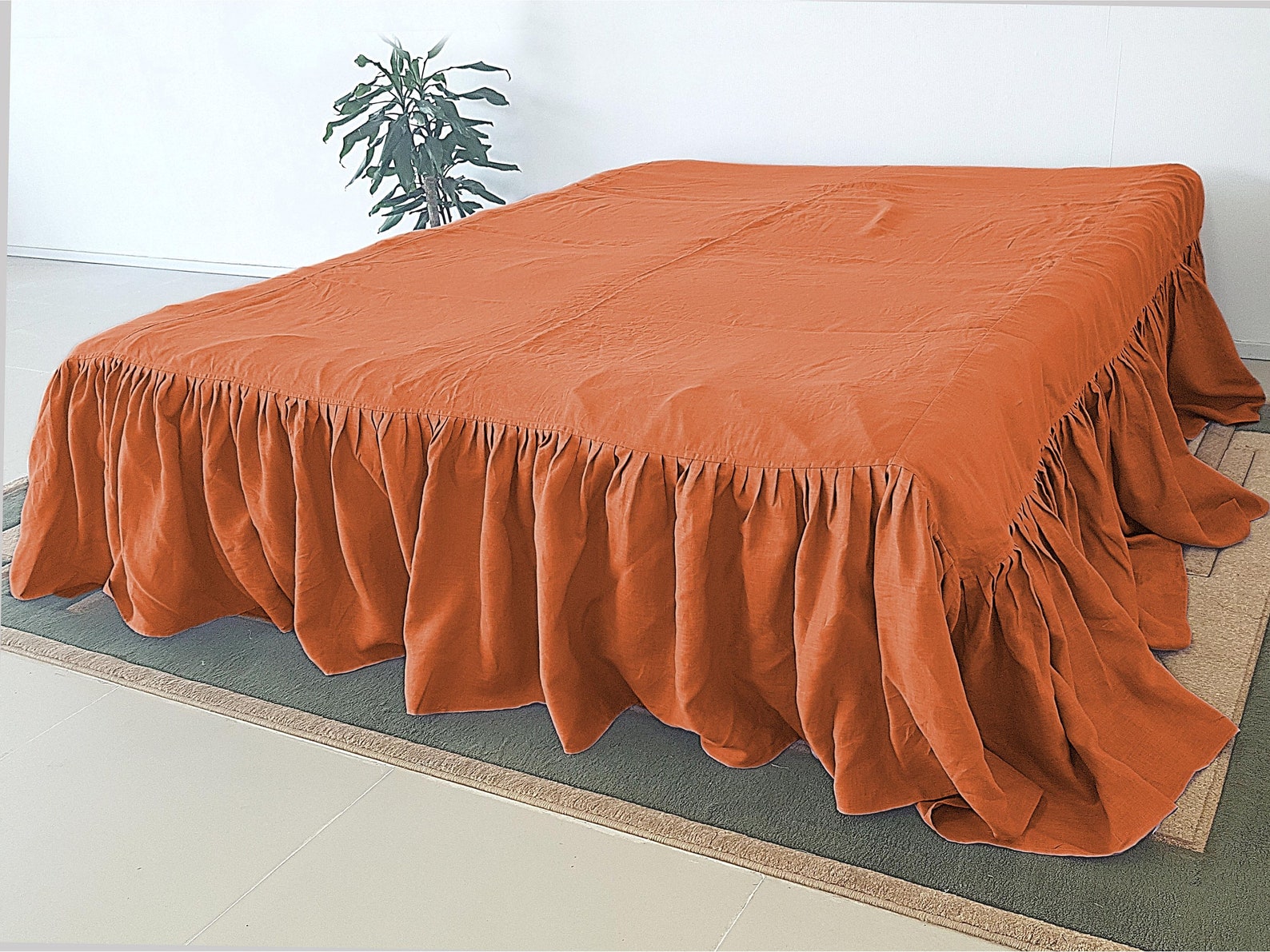 Ruffled Linen bedskirt in Orange with long dust ruffles from Etsy