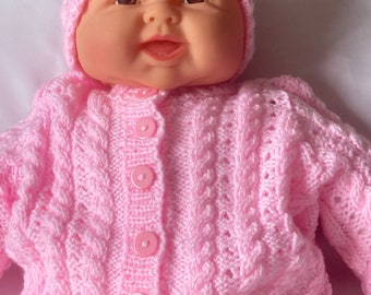 Pink baby cardigan and hat