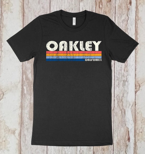 Vintage 80s Style Oakley Ca T-Shirt Vintage 80s Style Oakley Ca T-Shirt