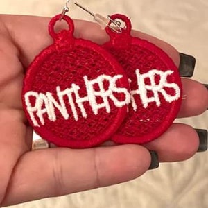 May include: Red embroidered earrings with the word "Panthers" in white lettering.