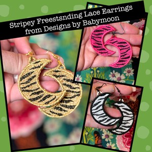 May include: Three pairs of crescent moon shaped earrings with a striped pattern. The earrings are in black and gold, black and white, and pink and black.