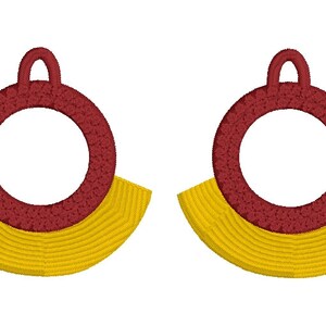 May include: A pair of earrings with a red circle and a yellow crescent shape. The earrings are made of a textured material.
