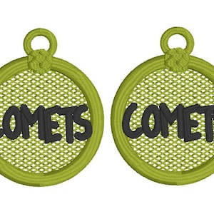 May include: Two green and black embroidered patches with the word "Comets" in a black, graffiti-style font.