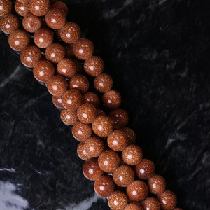 6mm Gemstone Rounds Goldstone Gr26