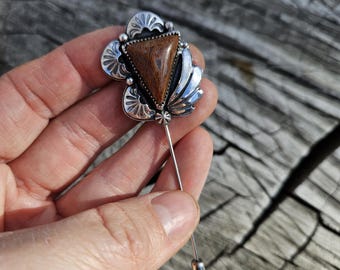 Hoedspeld/broche dinosaurusbot