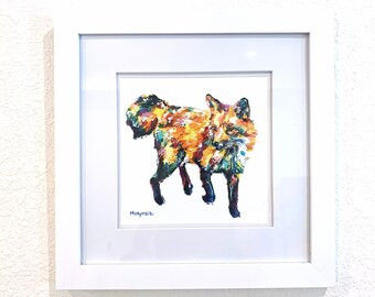 Könnte beinhalten: Ein gerahmtes Gemälde eines bunten Fuchses vor weißem Hintergrund. Der Fuchs ist in einem lebendigen Stil mit Orange-, Gelb-, Grün- und Blautönen gemalt. Die Unterschrift des Künstlers ist in der linken unteren Ecke sichtbar.