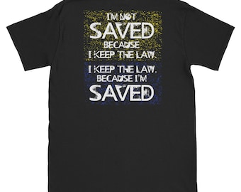 May include: Black t-shirt with a distressed white graphic that reads "I'm not saved because I keep the law. I keep the law because I'm saved."