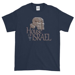 May include: A navy blue t-shirt with a graphic of two ancient Assyrian winged human-headed bulls. The text "House of Israel" is printed below the graphic, with a menorah symbol.