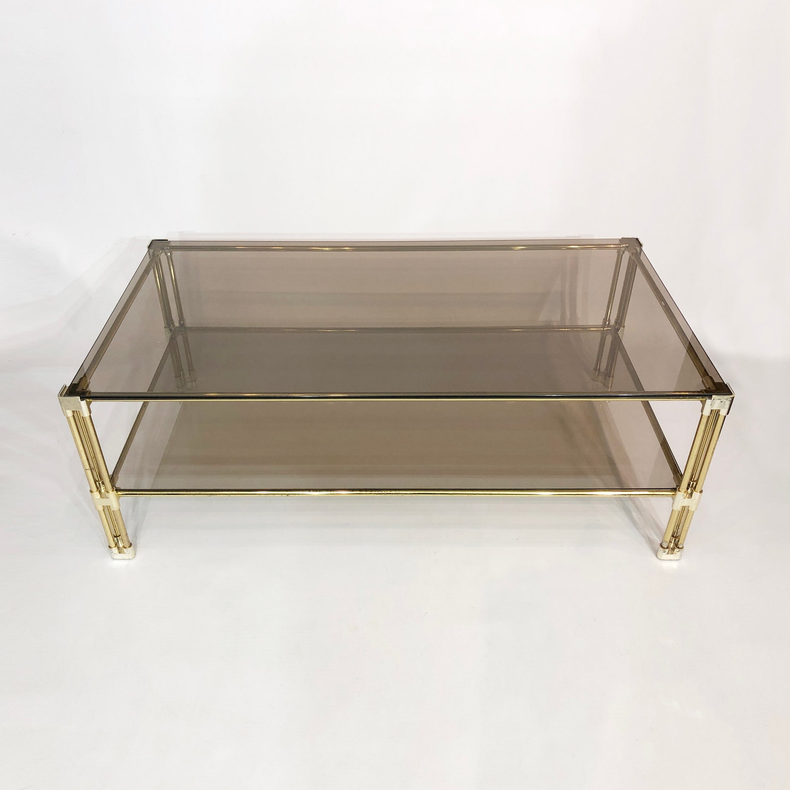 Brass Twotiered Coffee Table Hollywood Regency Gold Smoked Glass 1970s