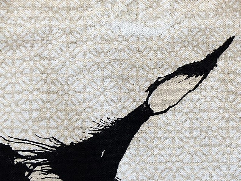 May include: Abstract black ink painting on a beige canvas with a white geometric pattern.