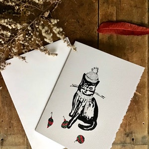 Carte de Noël / Carte de vœux / Carte de souhait / Chat / Noël / Temps des fêtes / sérigraphie / imprimé/ rouge / Québec / Montréal/ Chat
