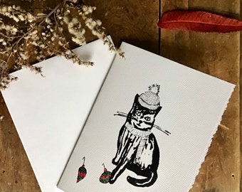 Carte de Noël / Carte de vœux / Carte de souhait / Chat / Noël / Temps des fêtes / sérigraphie / imprimé/ rouge / Québec / Montréal/ Chat