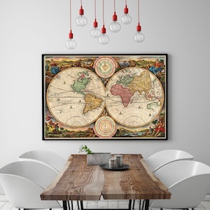 May include: A vintage world map print in a black frame, featuring a detailed illustration of the continents and oceans. The map is surrounded by a decorative border with intricate details. The print is hanging on a white wall above a wooden table with chairs.