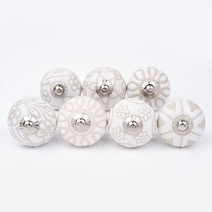Assorted White Ceramic Cabinet Knobs with Beige Floral and Geometric Patterns (Set of 6)