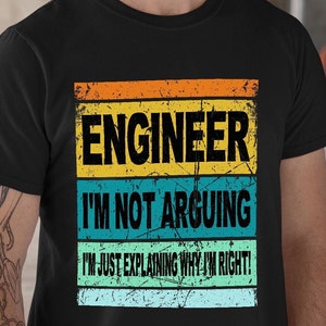 May include: A black t-shirt with a vintage-style graphic that reads "Engineer I'm not arguing I'm just explaining why I'm right!"