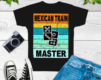 May include: Black t-shirt with a vintage-style graphic of dominoes and the text "MEXICAN TRAIN MASTER".