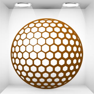 May include: A brown sphere with a honeycomb pattern, displayed in a white, illuminated alcove. The sphere's design features a series of interconnected hexagons, creating a textured, open surface. Two spotlights shine from above, highlighting the object.