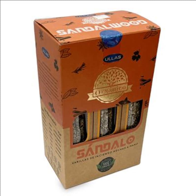 May include: A rectangular cardboard box of Ullas Organico sandalwood incense sticks. The orange and tan packaging features the text SANDALWOOD, S&Aacute;NDALO, and VARILLAS DE INCIENSO HECHAS A MANO, with a cutout window displaying the incense sticks.