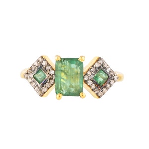 Emerald diamond geometric ring, top view flat on white background, gold vermeil prong-set