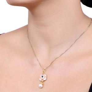 Designer Necklace With Gold Finished Brass, Shell Pearls & Natural Onyx Stone
