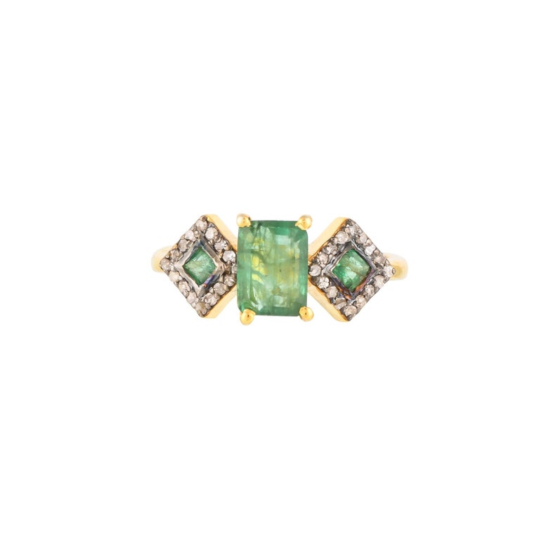 Emerald diamond geometric ring, top view flat on white background, gold vermeil prong-set